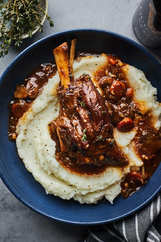 In herb butter roasted tender braised lamb with season's mushrooms