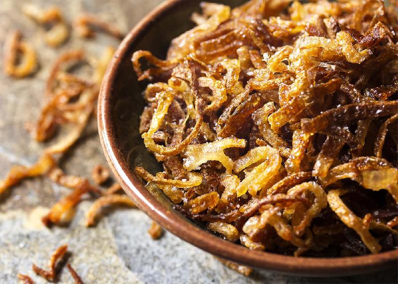 Anchovy butter fried pumpkin and deep fried shallot 