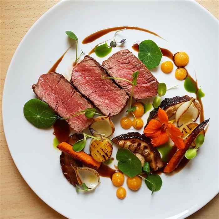 Grilled beef tenderloin and garlic potato fondant