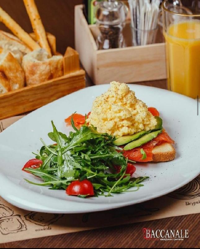 Scrambled eggs with smoked salmon and avocado