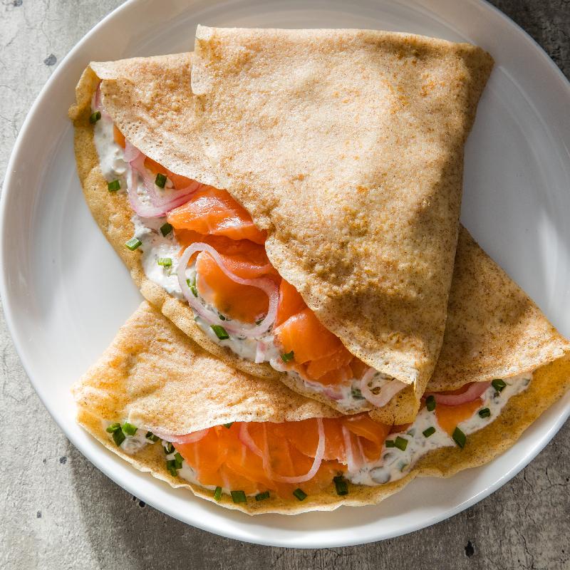 Crepes with smoked salmon, cream cheese and salmon caviar
