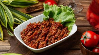 Acılı əzmə