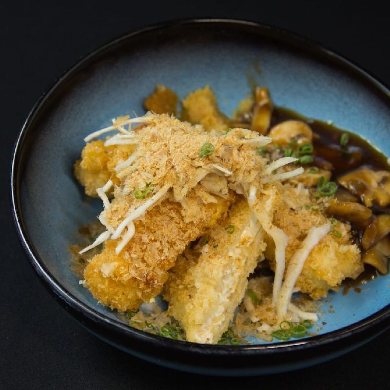 Fried tofu with mushroom sauce
