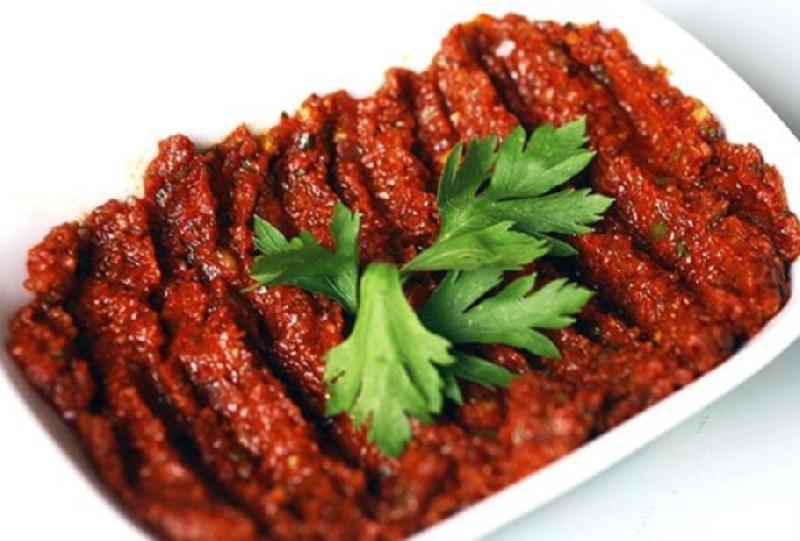 Acılı əzmə