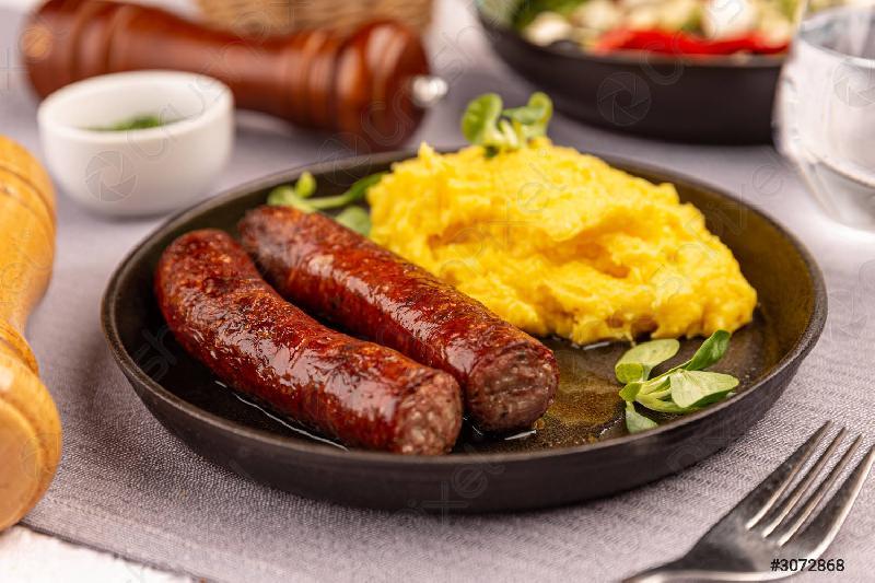 Homemade grilled mangalica sausage, provolone cheese,