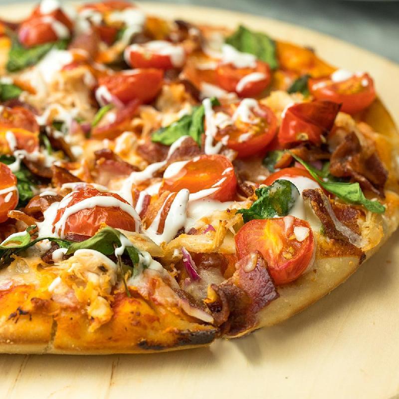 Spicy Chicken covered pizza