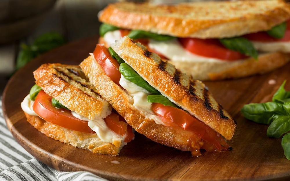 PANINI WITH MOZARELLA CHEESE, BASIL AND TOMATOES