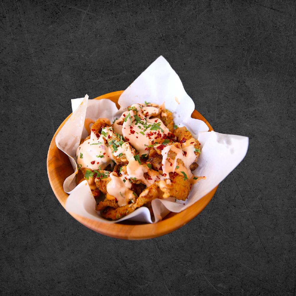 Bread crumb chicken chips with minada sous