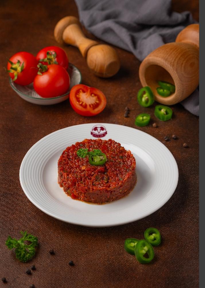 Acılı əzmə