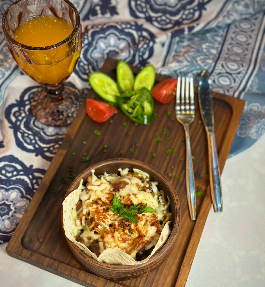 Quzu qovurma (güvəc)