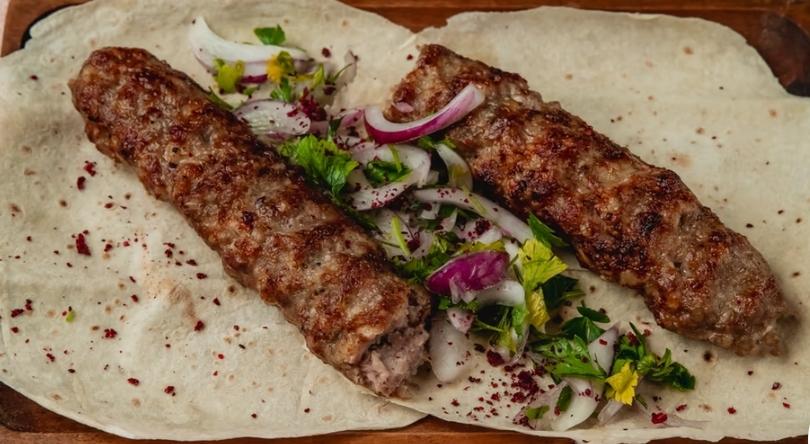 Lula Kebab.       (Due to charcoal grill preparation, kabab dishes are served with a minimum order of 2 portions.)