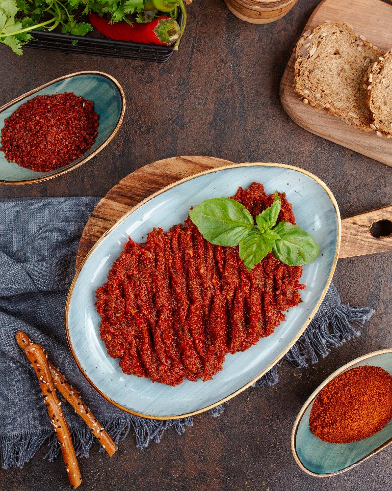Acılı əzmə